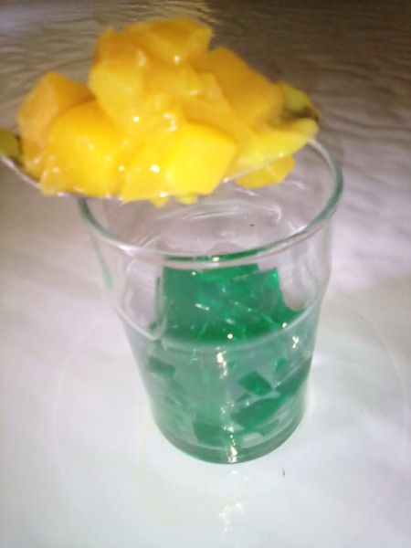 putting mango in cup