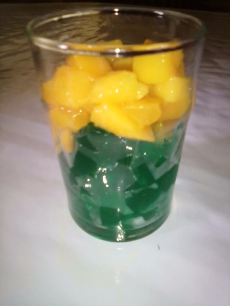 mango on gelatin in cup