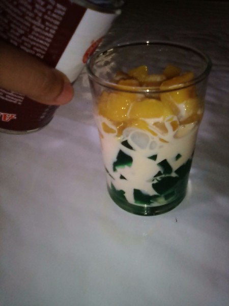 evaporated milk added to cup