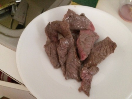 cooked beef strips on plate