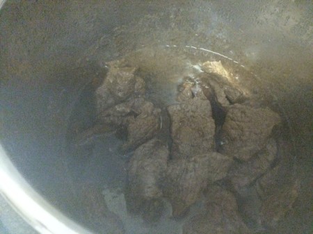 cooking beef strips in pan