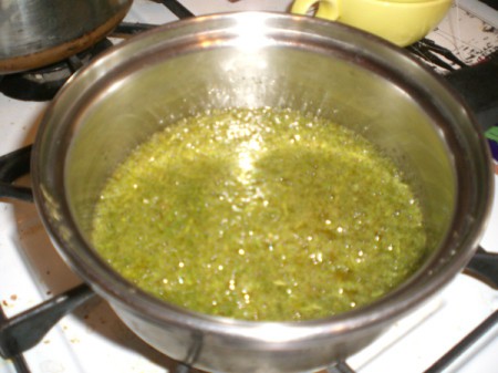 oil and rosemary in pan