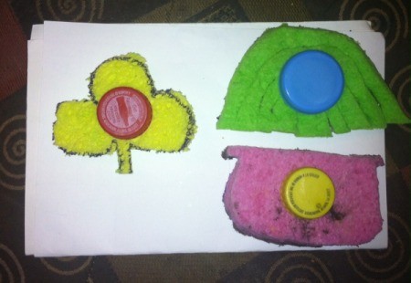 St. Patrick's Day Sponge Paintings - for young children glue a soda cap to one side of the sponge to use as a handle
