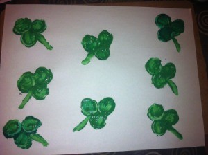 Shamrock Stencil Painting - shamrocks on white paper