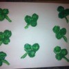 Shamrock Stencil Painting - shamrocks on white paper