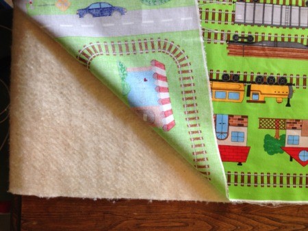 Fabric Panel Playmat - place one panel over the batting
