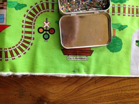 Fabric Panel Playmat - smooth and pin panel onto batting