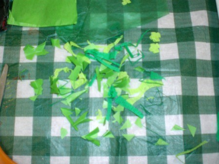 Shamrock Suncatcher - peel the backing off and sprinkle paper bits onto contact paper staying away from the edges