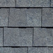A row of shingles on a wall or roof.