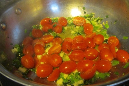 tomato and onion in pan