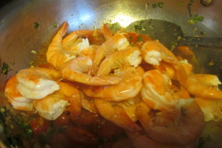 Shrimp added to pan