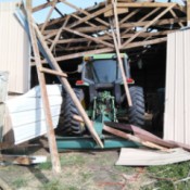 Keep an Inventory of What You Own - small shed barn collapsed on tractor