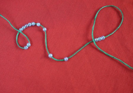 Paperclip and Bead Wrapped Earrings - thread beads onto floss