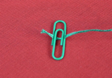 Paperclip and Bead Wrapped Earrings - catch end of floss in clip