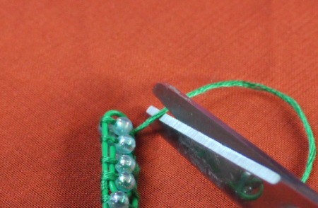 Paperclip and Bead Wrapped Earrings - trim floss close to knot