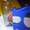 Magnetic Discovery Bottles - magnet against bottler with pipe cleaner bits