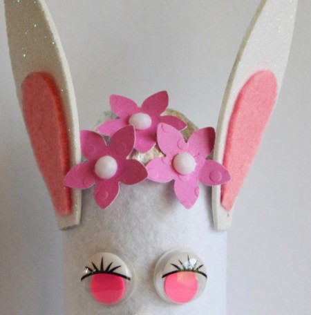 Upcycled Easter Bunny Craft - punch pink flowers from card stock and glue to head adding a rhinestone to the centers