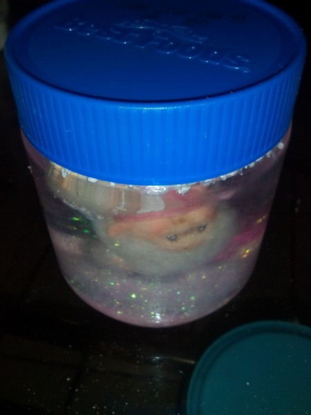 Easy Snow Globe - put lid on jar, you can glue it in place to prevent spills