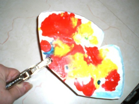 Make a Spring Butterfly from a Paper Plate - punch a hole when the paint is dry