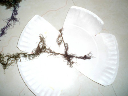 Make a Spring Butterfly from a Paper Plate - tie yarn together in back