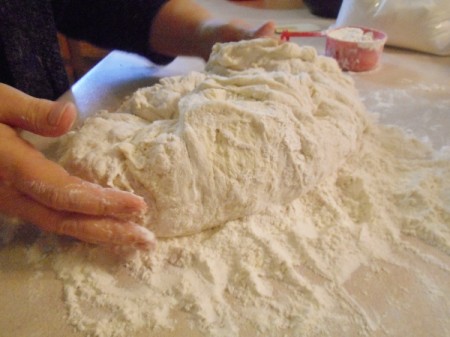 Mom's Herb BreadBread dough being kneaded.