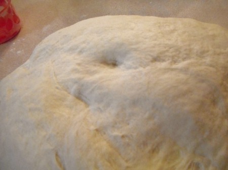 Bread dough being kneaded.