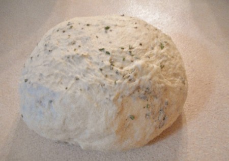 A ball of herb bread dough.