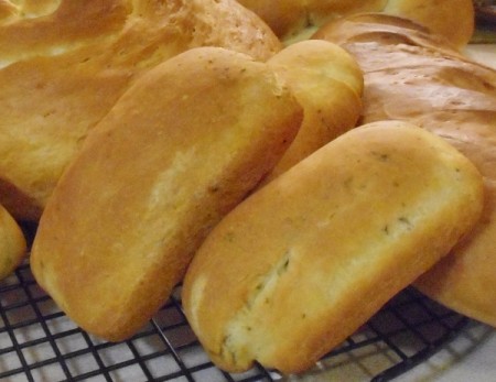 Loaves of freshly baked herb bread.