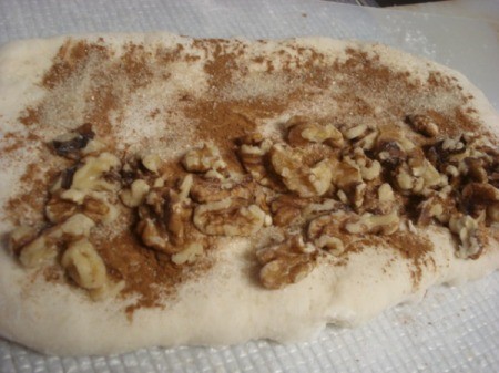adding walnuts on dough