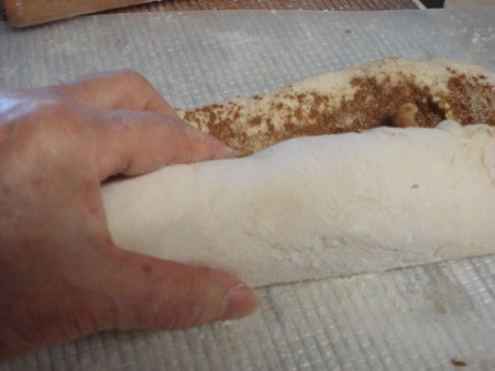 rolling up ingredients in dough