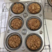 baked applesauce oat muffins in tin