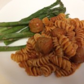 Spaghetti and Meatballs on plate with asparagus