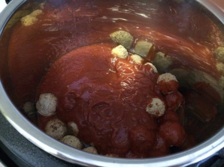 spaghetti and meatballs in pan