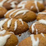 A cream cheese glaze on top of muffins.