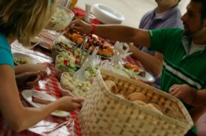 A buffet line at a large gathering.