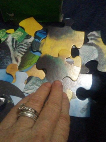 A jigsaw puzzle being put together.