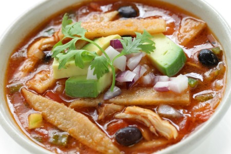A bowl of chicken tortilla soup.