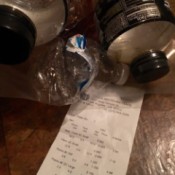 Recycled bottles with a receipt.