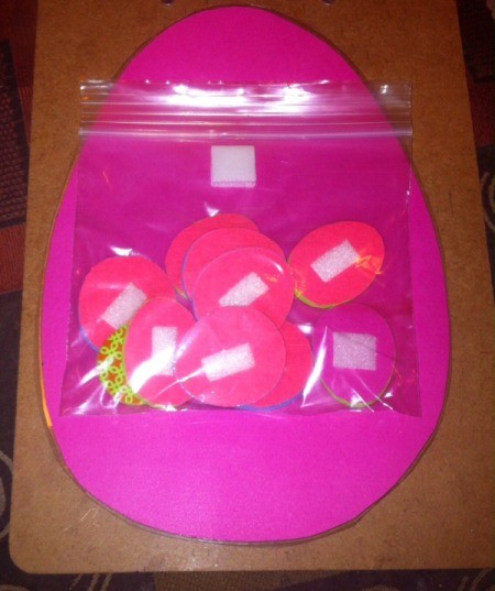 Easter Tic-Tac-Toe - plastic bag on back of board to store pieces