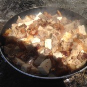 Stir fry being cooked in a pan.