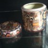 Value and Age of Japanese Motif Covered Jar - jar with led removed on glass shelf