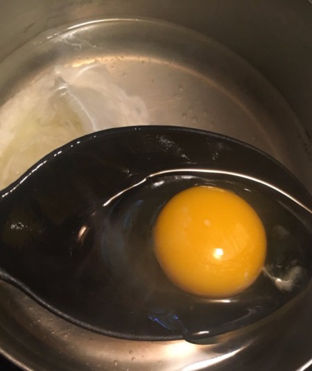 A egg being poached.