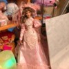 Identifying a Porcelain Doll - doll in fancy 1890s style pink dress