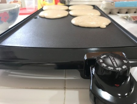 Pancakes on an electric griddle.