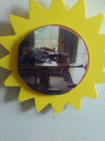 A photo magnet made with Modge-Podge.