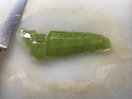 cutting peeled aloe
