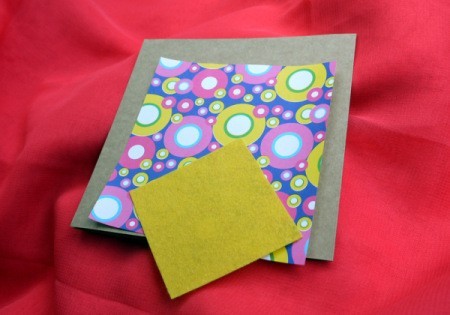 Birthday Parcel Card - Cut a piece of felt slightly smaller than the gift wrap.