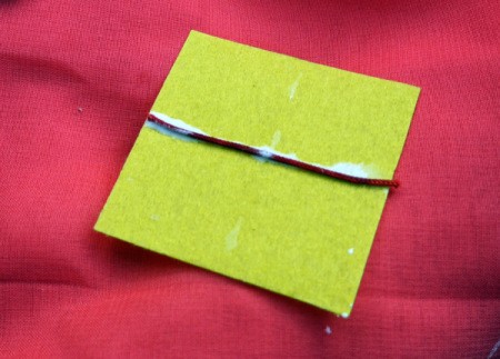 Birthday Parcel Card - glue length of cord to felt