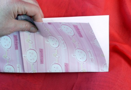 How to Make a Matching Curly Gift Bow - fold square of wrap in half