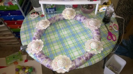 Mini Hat Spring Wreath - Arrange hats equally around the wreath and hot glue in place.